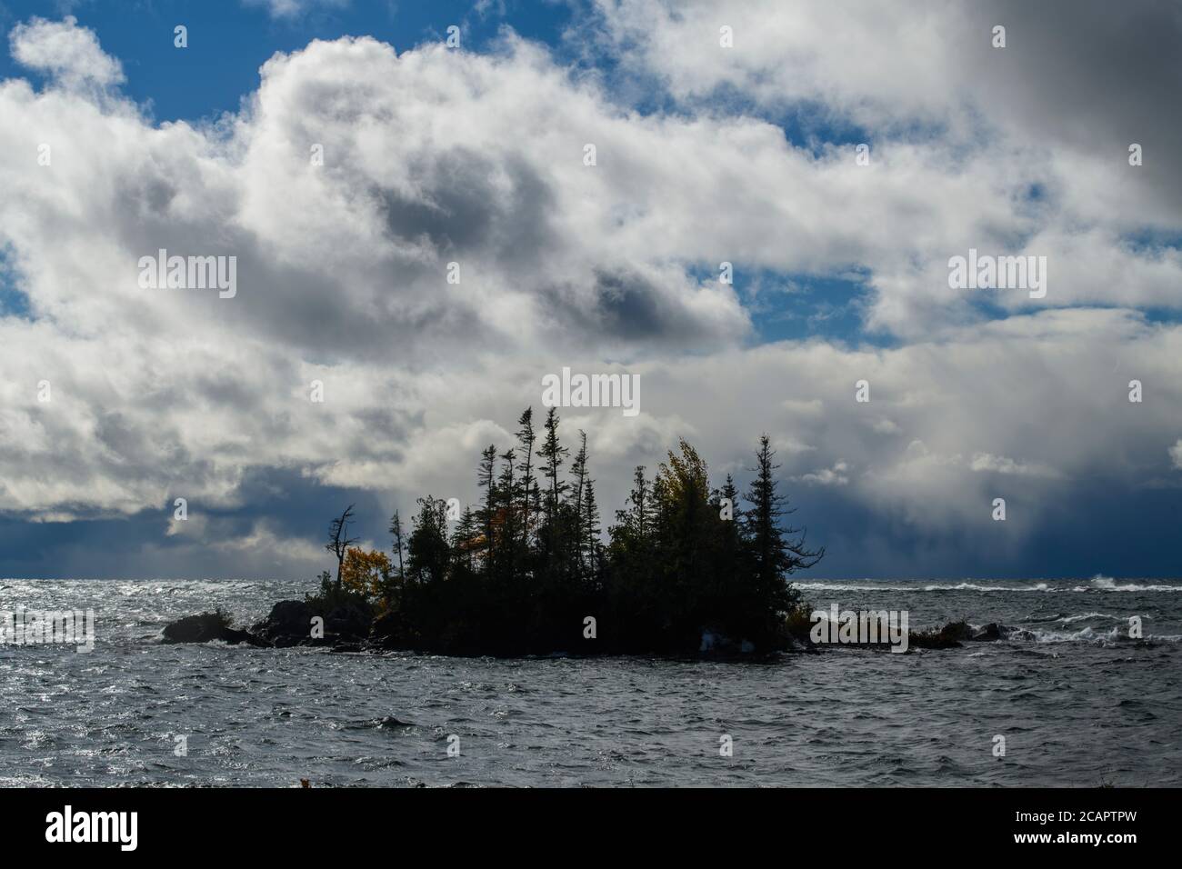 Lake Superior with squall clouds and small island, Batchawana Bay ...