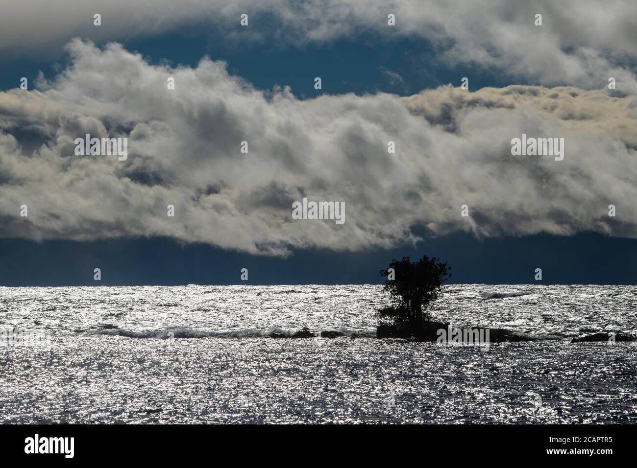 Lake Superior with squall clouds and small island, Batchawana Bay ...