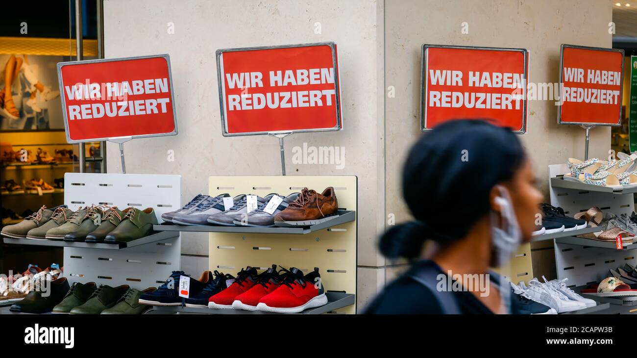 Essen, North Rhine-Westphalia, Germany - discount battle in the corona crisis, retail sales in times of the corona pandemic, posters in shop windows, Stock Photo