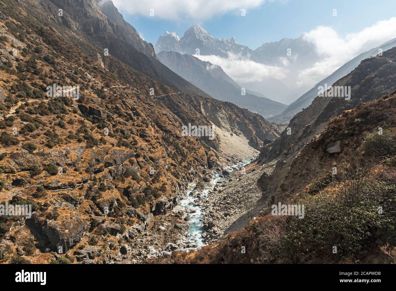 Thamserku and the surrounding peaks overlooking the Bhote Koshi river as it flows down from Thame. Stock Photo