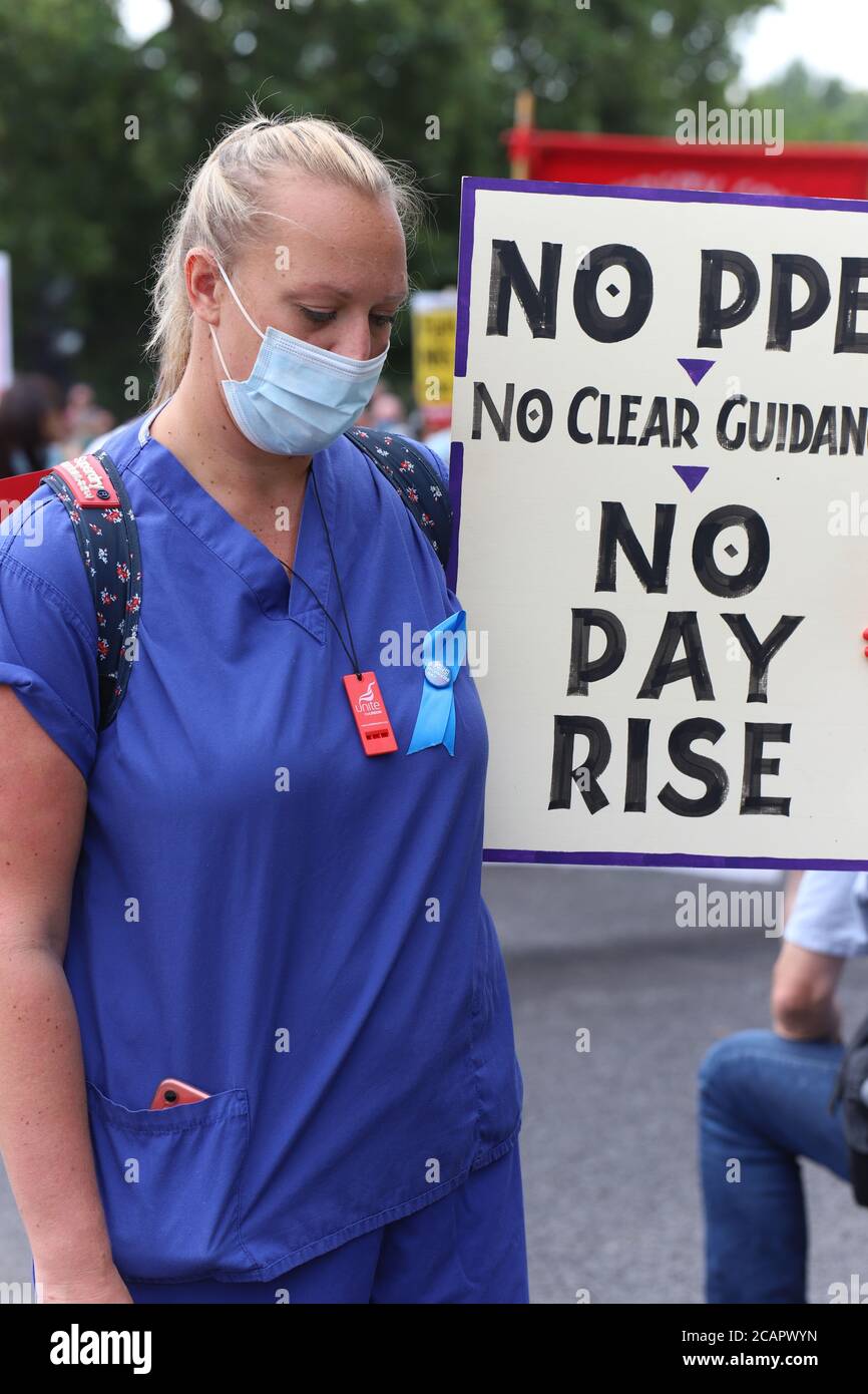 London, UK. 8th Aug 2020. National Health Service workers in central London protest against their exclusion from the public sector pay increase. Protesters assembled in St James's Park before marching to Parliament Square, via Downing Street. Credit: Denise Laura Baker/Alamy Live News Stock Photo