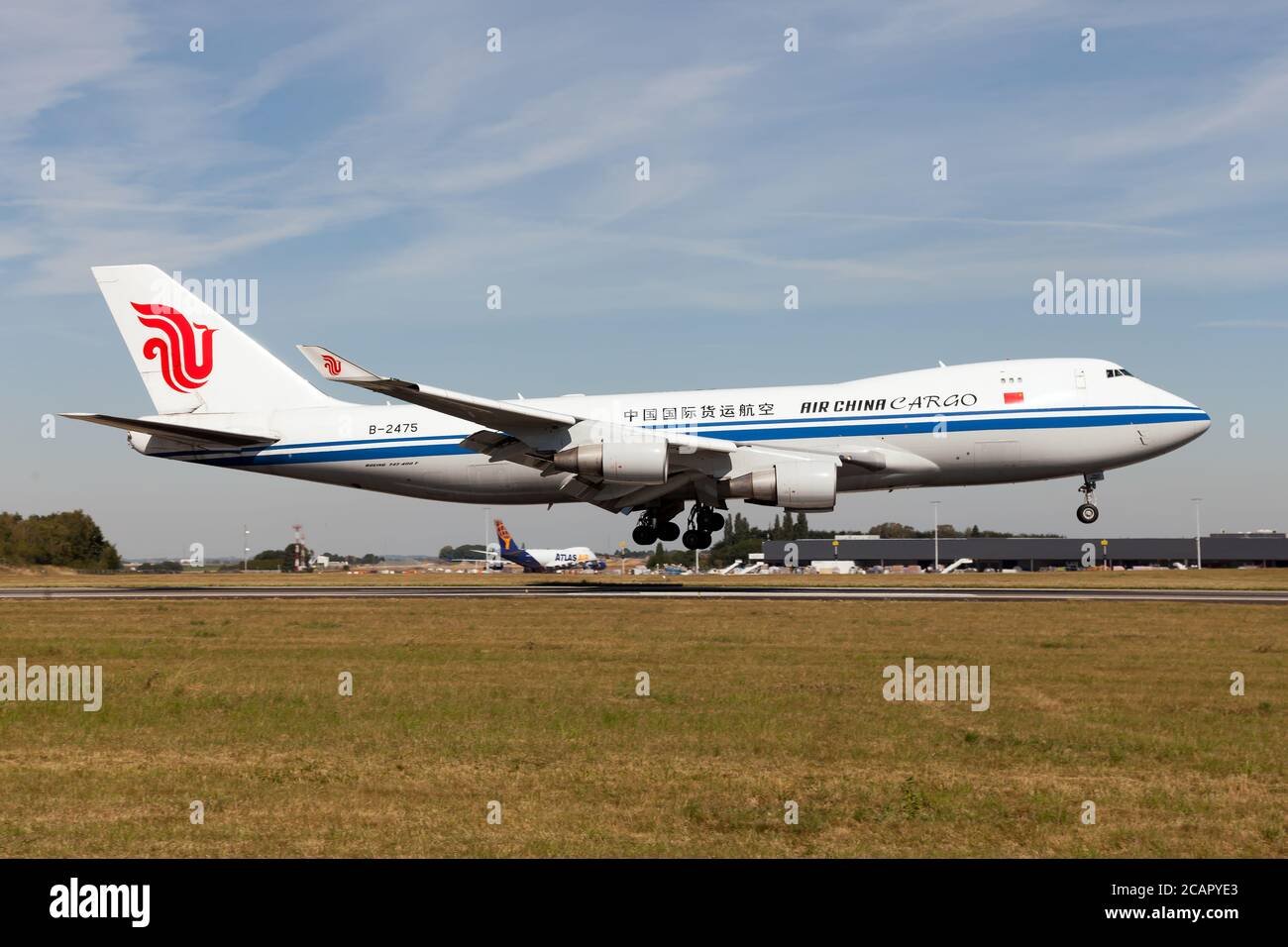 An Air China Cargo Boeing 747-400 freighter landing at Liege Bierset Airport. Stock Photo