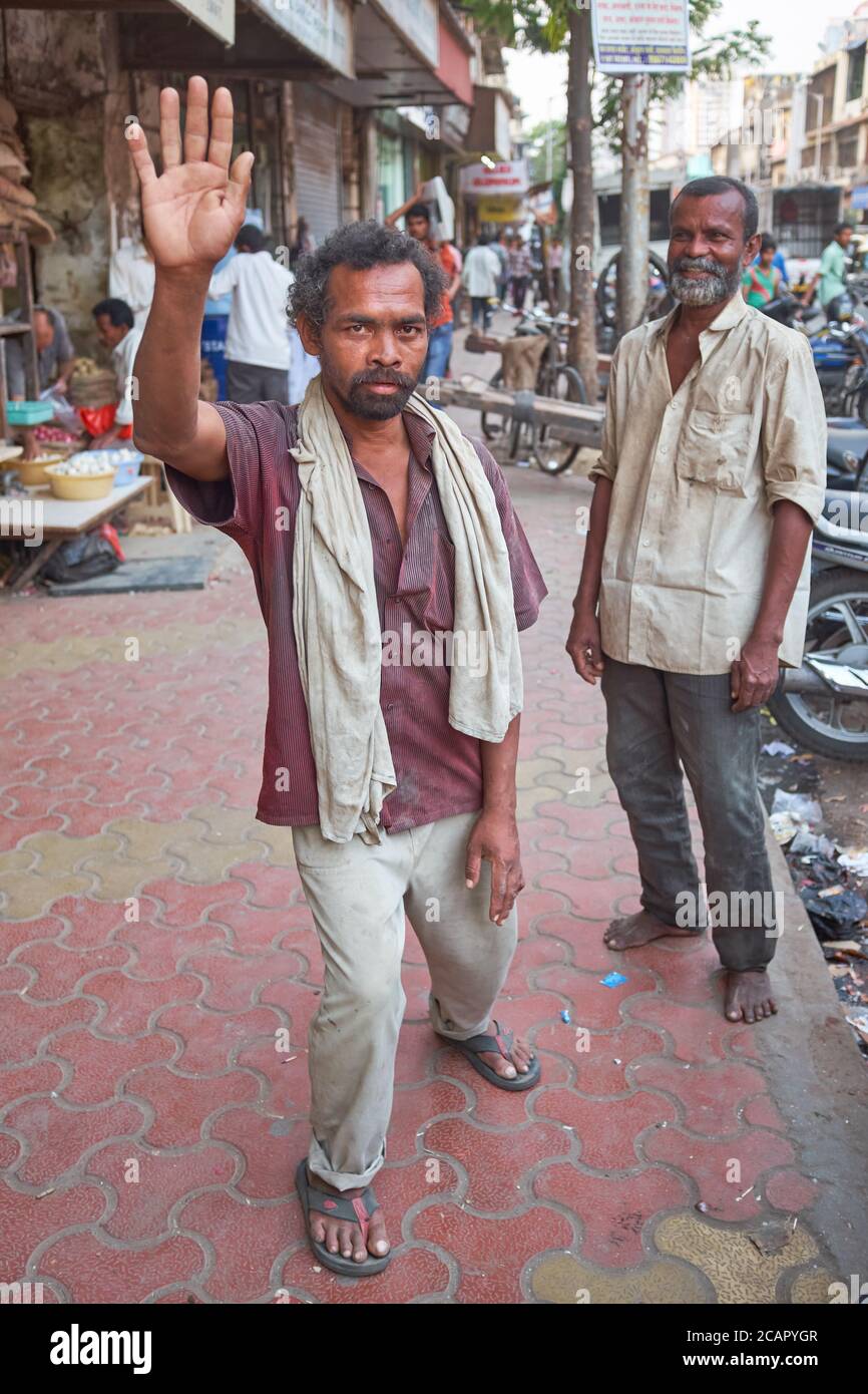 Two happy drunks in less than well-reputed Khetwadi area in Mumbai, India, haunt of many drunks, drug addicts and prostitutes Stock Photo