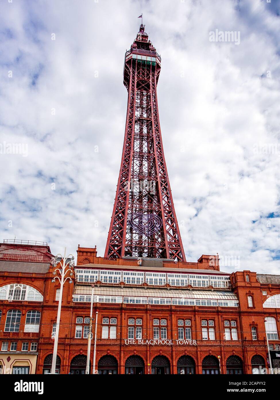 The world famous Blackpool tower from the seafront on a cloudy but bright day. Stock Photo