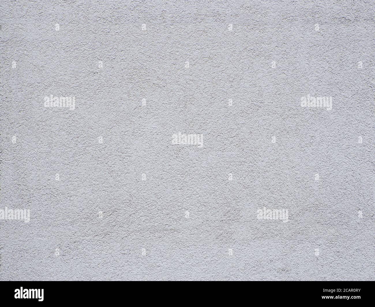 Light wall plastered into small crumbs. Backgrounds and textures. Stock Photo