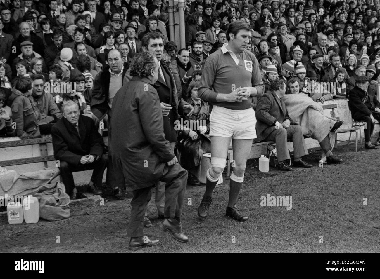 Llanelli RFC replacement flanker Roger Hyndman waiting to head into the fray of the WRU Cup Semi-Final clash with Bridgend RFC held at St Helens Rugby and Cricket Ground, Swansea, Wales on 23 March 1975. Stock Photo