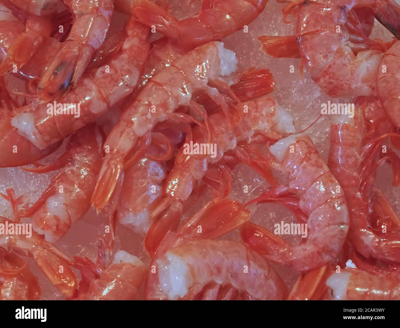 Macro of raw shrimps at a food market Stock Photo