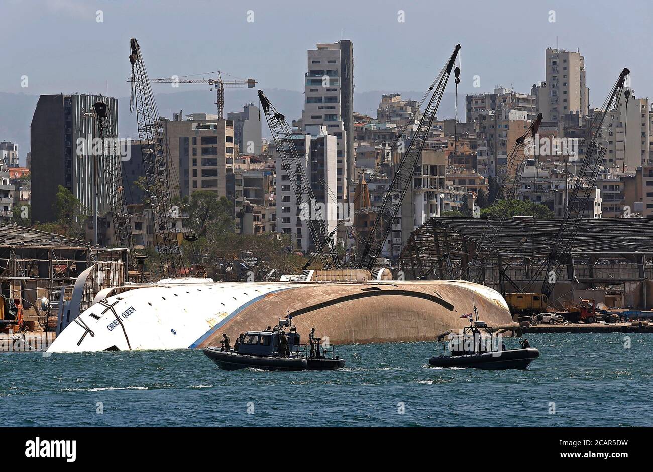 Beirut. 8th Aug, 2020. A damaged ship is seen at the Port of Beirut in Lebanon, Aug. 8, 2020. The Lebanese Health Ministry announced on Saturday that 158 people died and 6,000 were wounded by the huge explosions that hit Beirut's port on Tuesday. Credit: Bilal Jawich/Xinhua/Alamy Live News Stock Photo