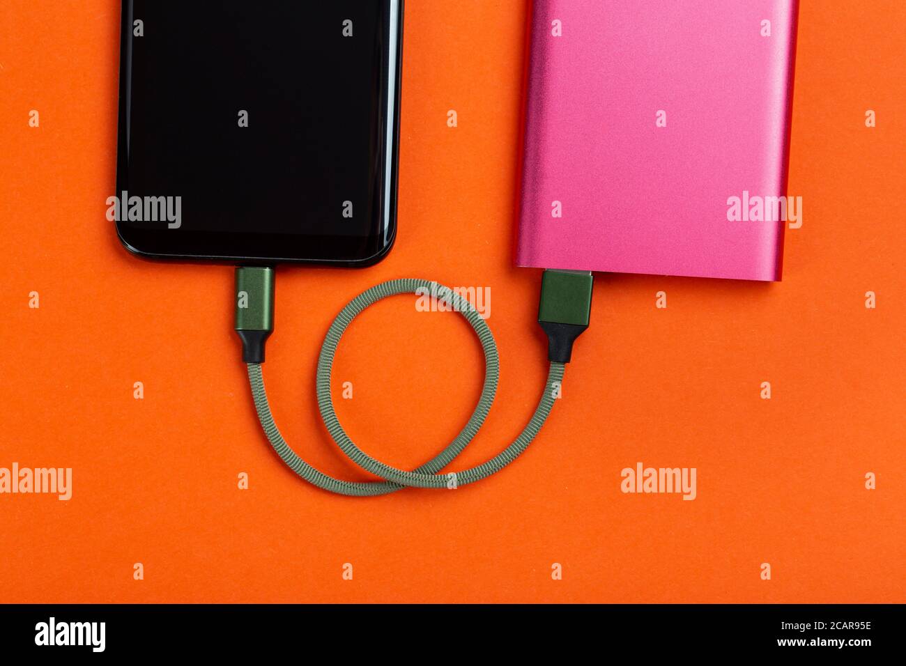 Smartphone charging with power bank. Portable power bank for charging