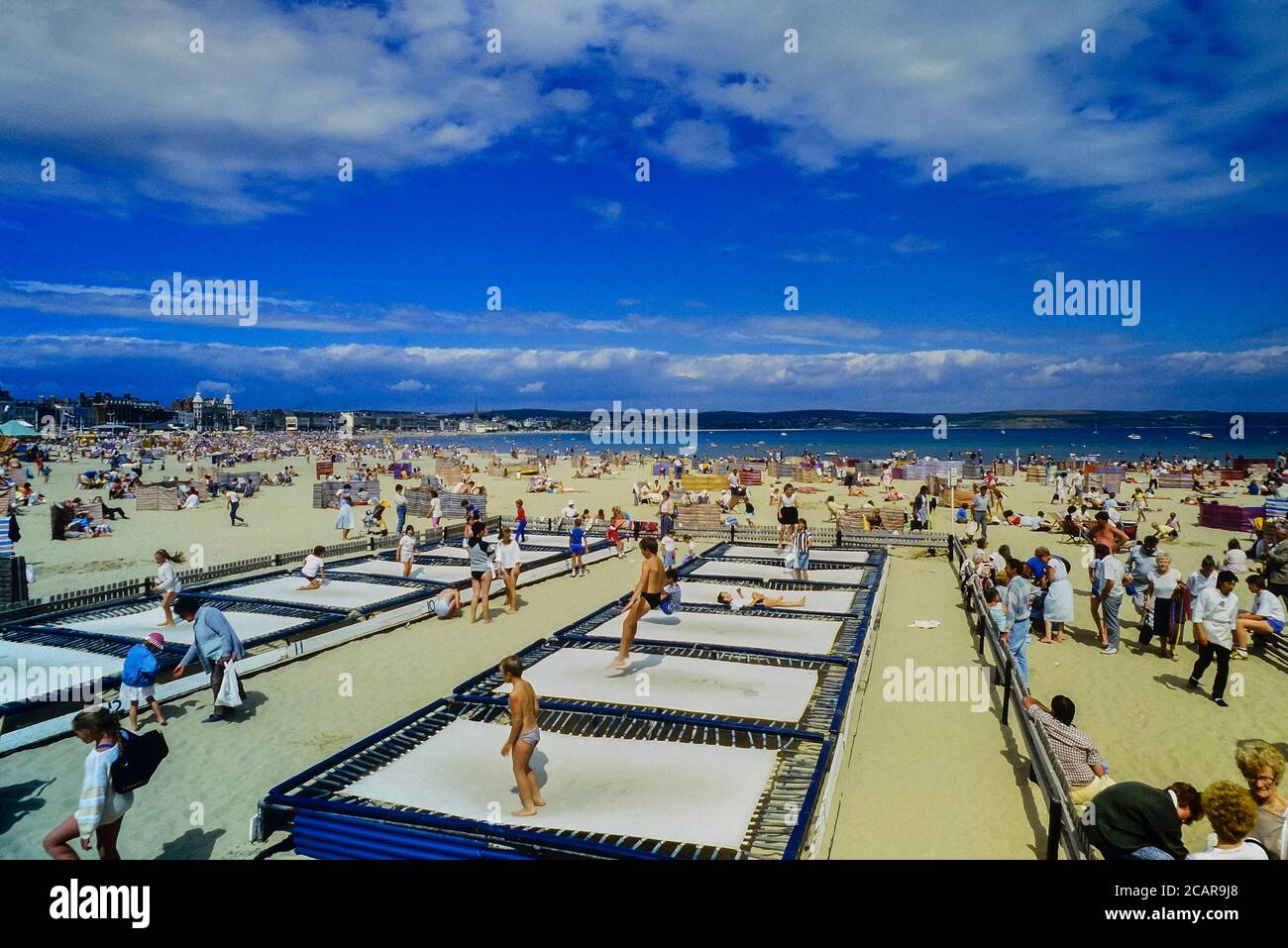 Beach trampolines, Weymouth, Dorset, England, UK Stock Photo Alamy