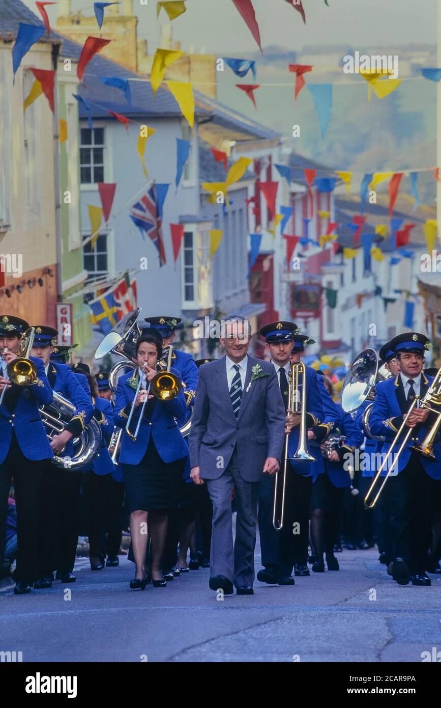 Helston Town Band leading the dancers at Flora Day, Helston, Cornwall, England, UK. 1991 Stock Photo