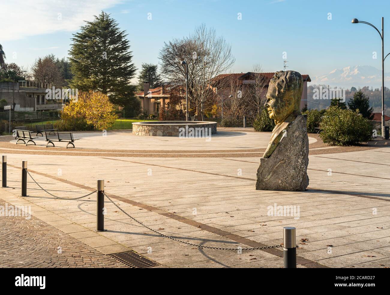 Azzate, Varese, Italy - December 6, 2019: View of Belvedere square with bronze statue to Antonio Ghiringhelli in Azzate, province of Varese, Italy Stock Photo