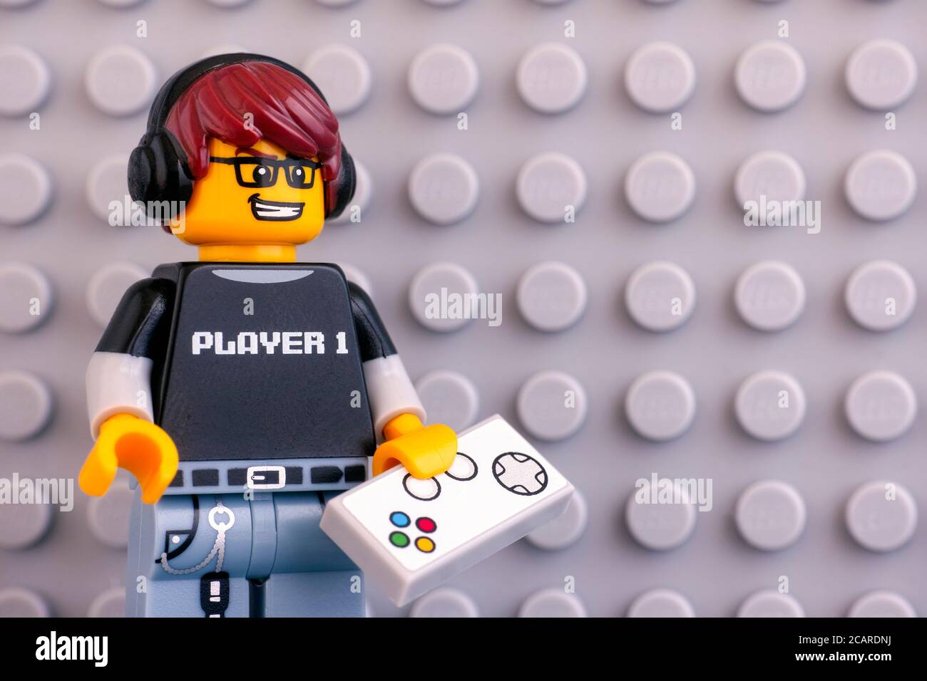 Tambov, Russian Federation - June 04, 2020 Portrait of Lego Video Game Guy  minifigure with gamepad against Lego gray baseplate background. Studio shot  Stock Photo - Alamy