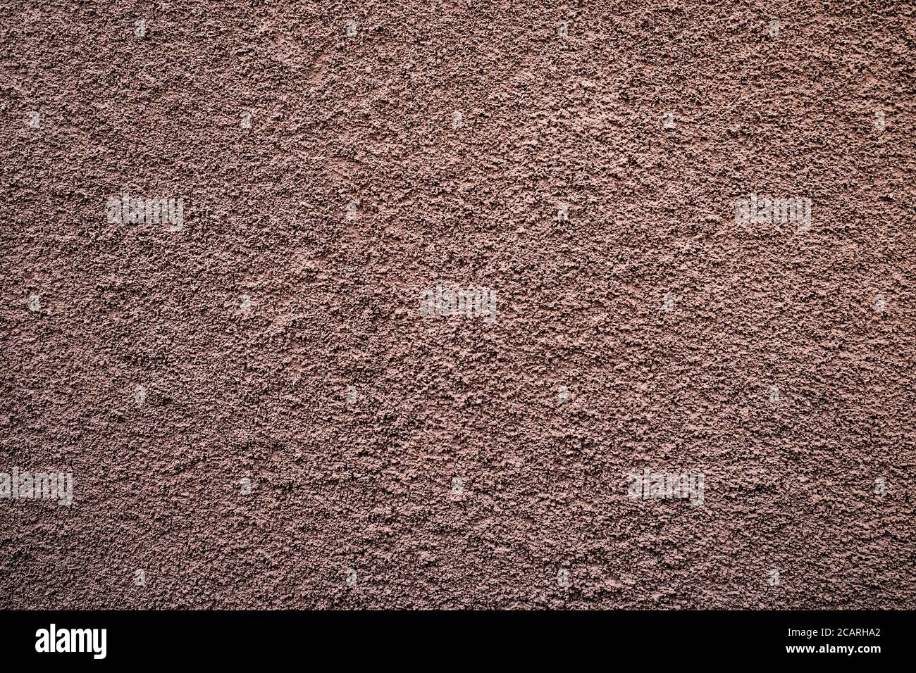 Pale subdued flat tone bronze textured background. Stock Photo