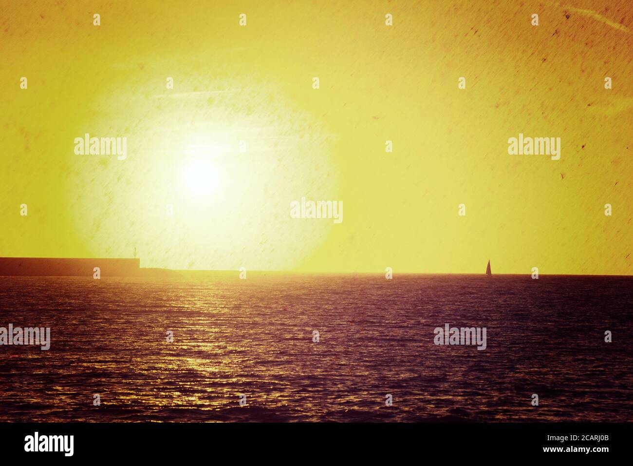 boat alone in the sea at sunset in vintage tone effect Stock Photo - Alamy
