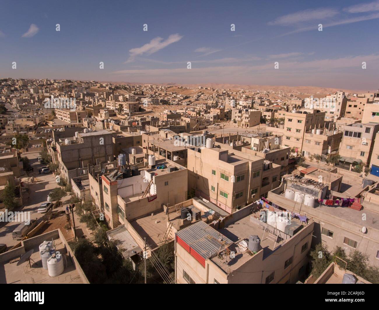 Rooftop water tanks are a common sight in the arid, sprawling city of Zarqa, Jordan, a separate