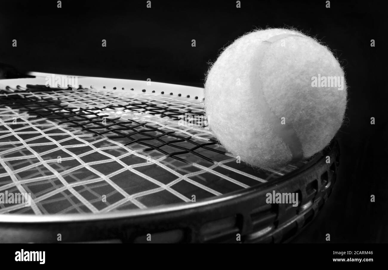 Tennis ball and racket in black and white Stock Photo - Alamy