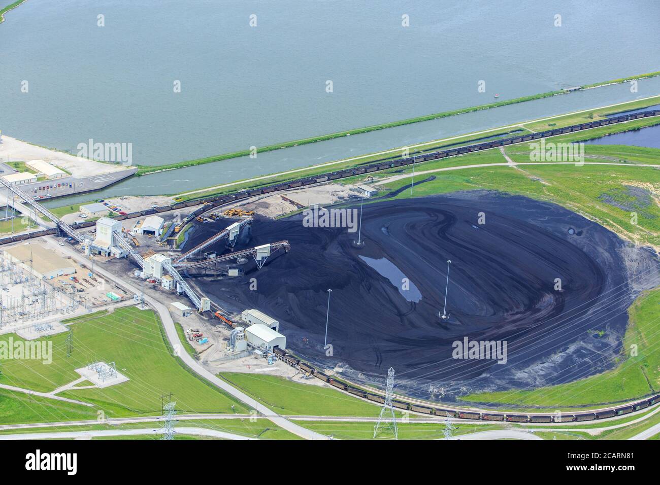 Aerial Photo of Coal Stockpile at Power Plant Stock Photo