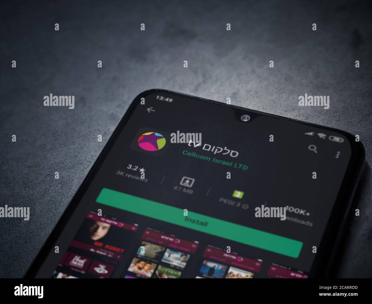 Lod Israel July 8 2020 Cellcom Tv App Play Store Page On The Display Of A Black Mobile Smartphone On Dark Marble Stone Background Top View Flat Stock Photo Alamy