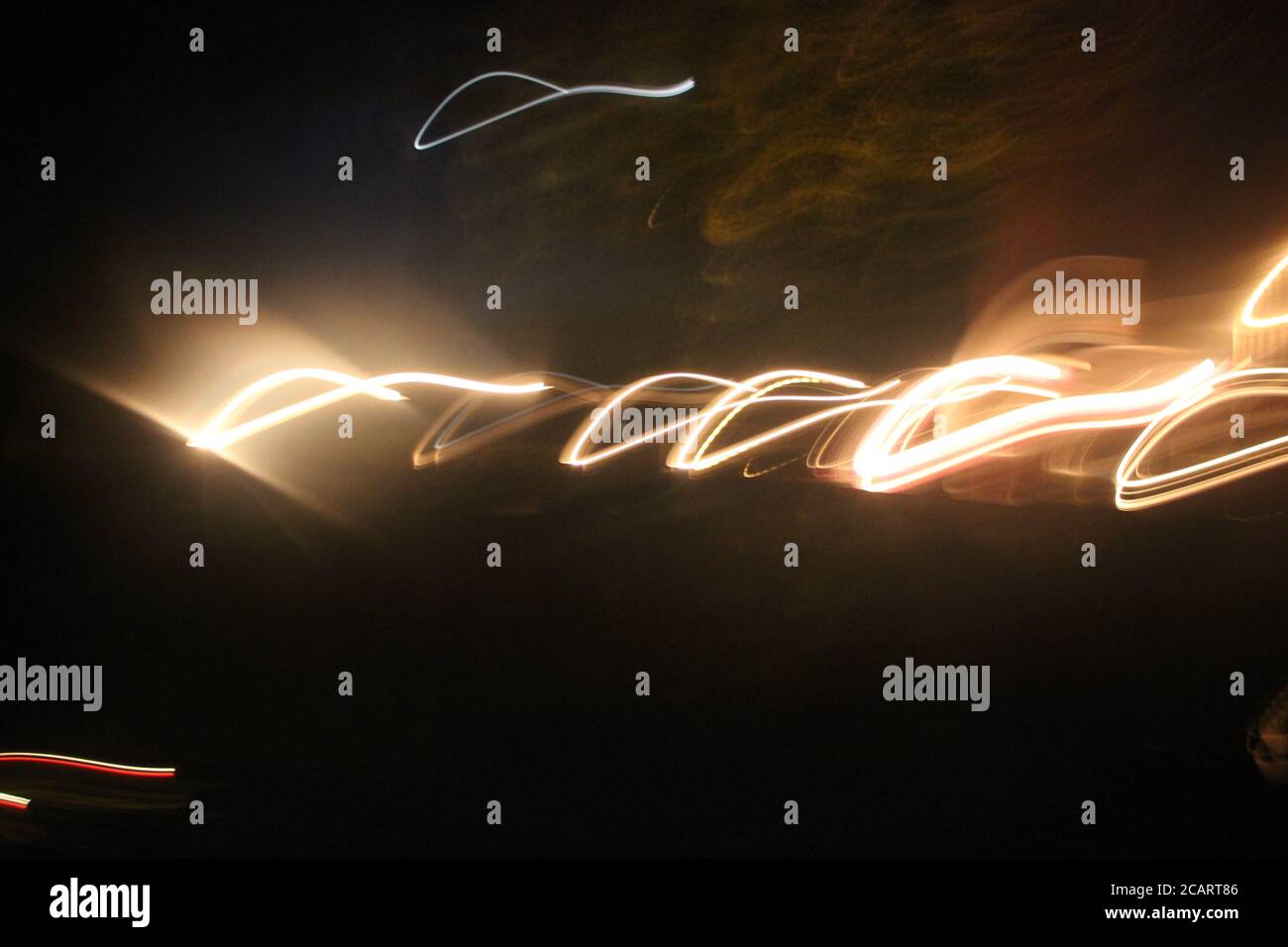 Abstract yellow blur on black. Lights motion effects creative background Stock Photo