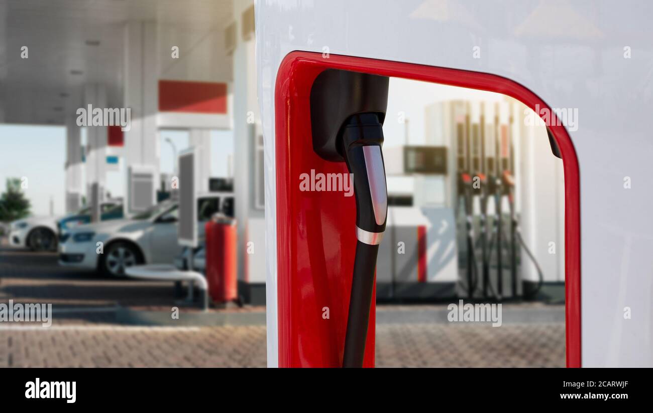 Charging station for electric vehicles in the background of a gas station Stock Photo