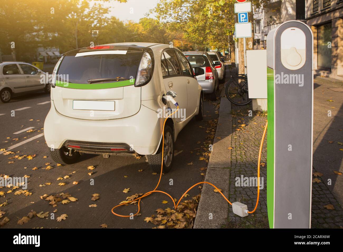 Carsharing electric car with charging station Stock Photo Alamy