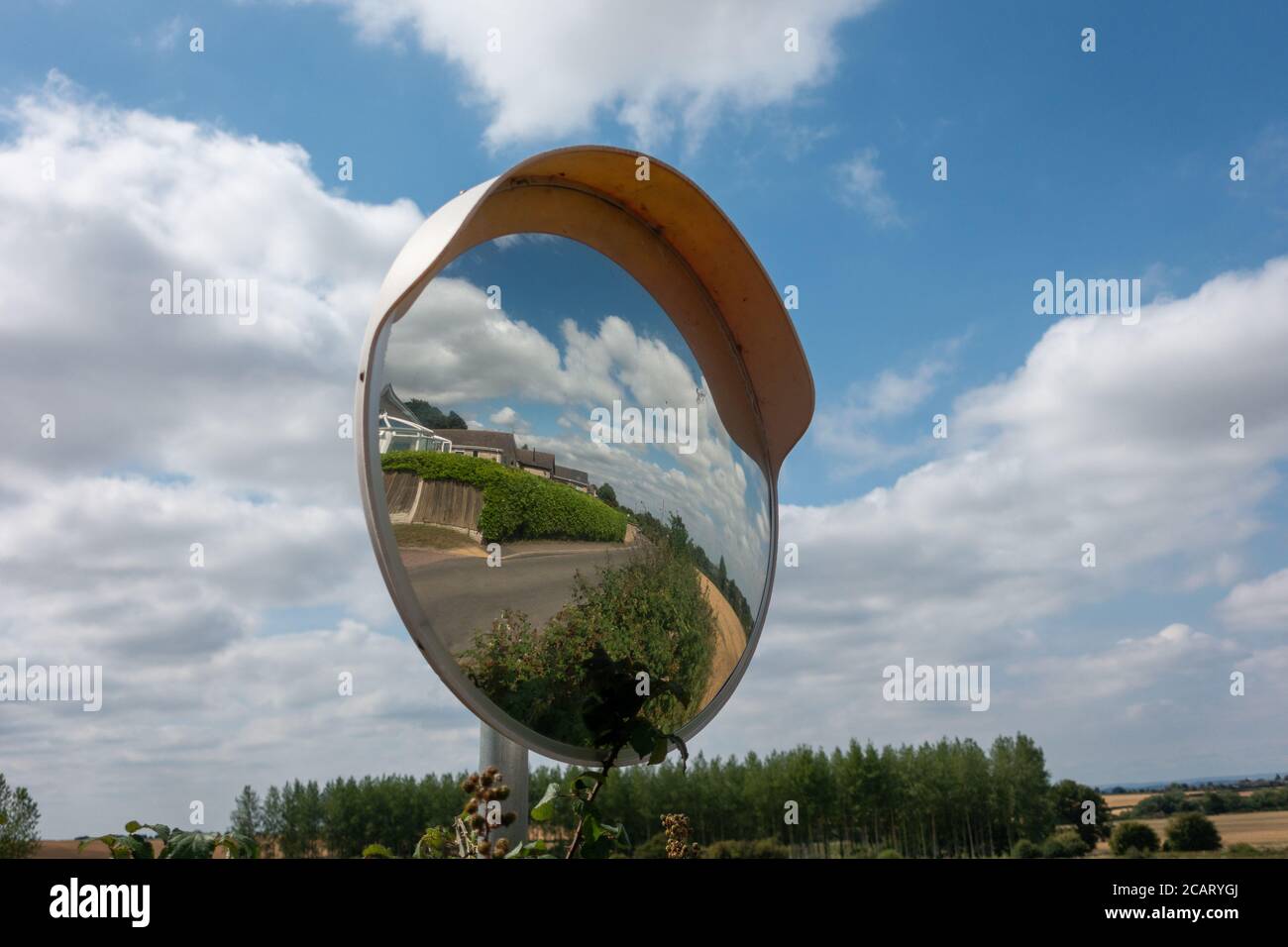 Driveway convex circular mirror. Helps improve visibility around blind
