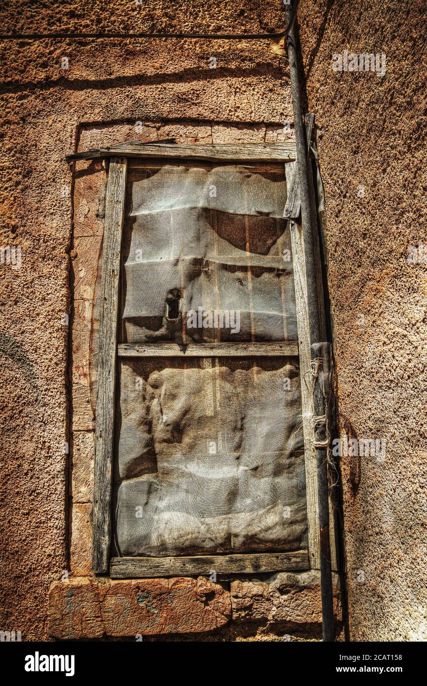 broken window in an old wall in hdr tone mapping effect Stock Photo - Alamy