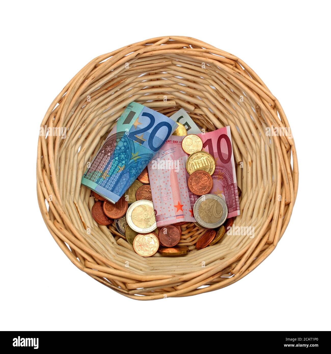 Basket with donation money in front of white background Stock Photo