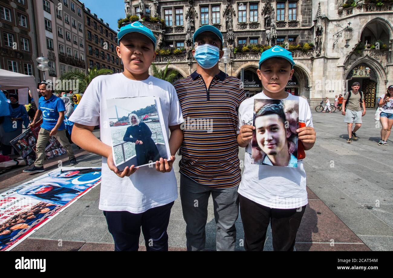 Munich, Bavaria, Germany. 8th Aug, 2020. Bringing attention to the deteriorating situation in the Xinjiang Province of China, German Uyghurs demonstrated at Munich's Marienplatz. Potentially 11 million Uyghurs live under oppression in China with 150 of the largest concerns in Europe have economic interests in the region and Uyghurs in their supply chain, such as Nike, Volkswagen, Apple, BMW, Samsung, Huawei, Sony, and others. There are some 800 Uyghurs in the exile community in Munich. Credit: Sachelle Babbar/ZUMA Wire/Alamy Live News Stock Photo