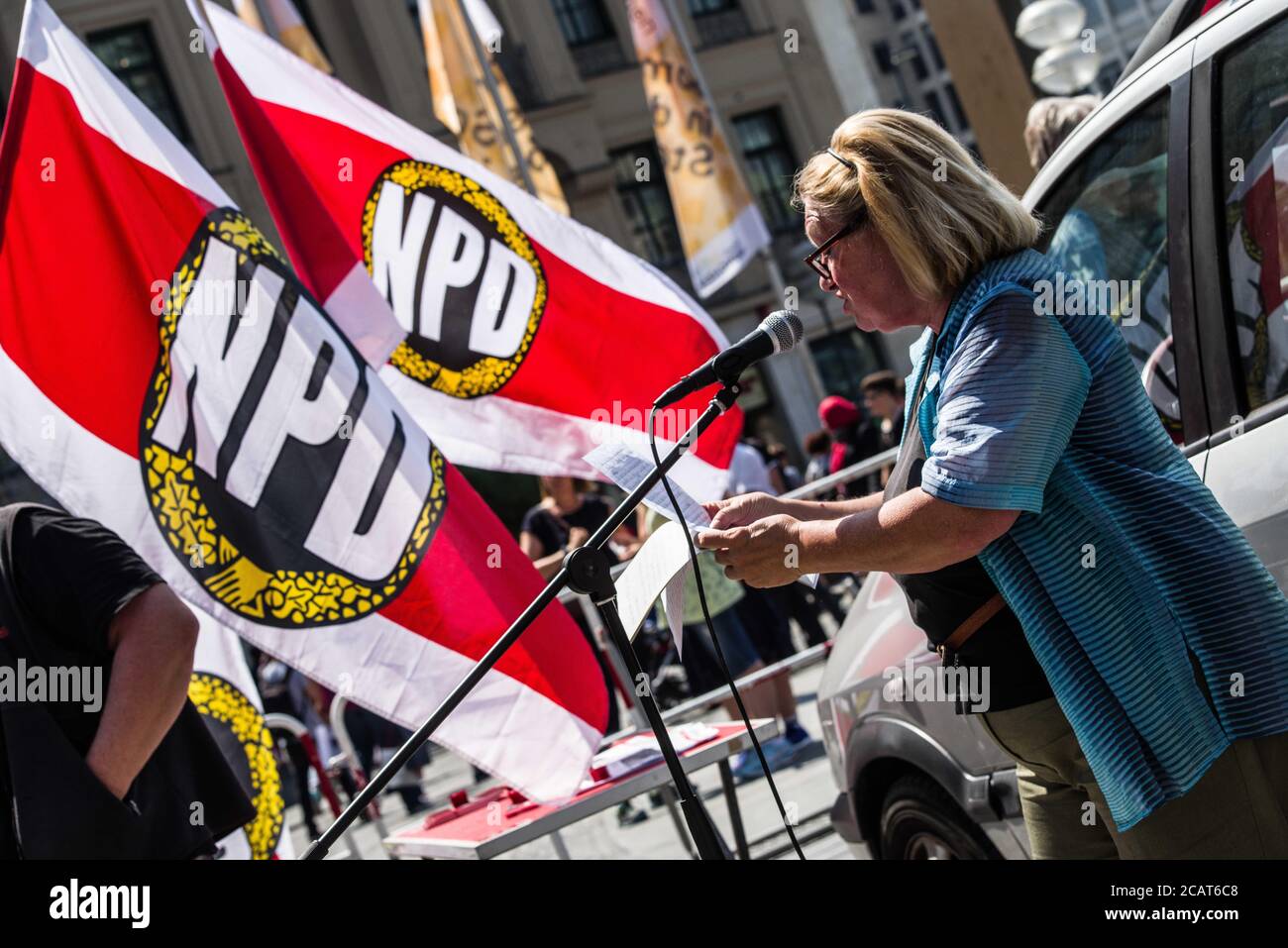 Munich, Bavaria, Germany. 8th Aug, 2020. RENATE WERLBERGER of the neonazi NPD. Looking to capitalize on the Coronavirus crisis, racism, discontent with non-whites in Germany, and with Black Lives Matter, the neonazi NPD party of Munich held a 'Also White Lives Matter'' [sic] rally at Munich's Stachus. Ten attended, which included Franz H., Pia V., Manfred Schiessl, a BIA member who also is an Ordner at the Coronademos, and several others including neonazi Josef. H., who, among two other participants, was engaged in long conversations with the controversial Munich Police Kommunikationst Stock Photo