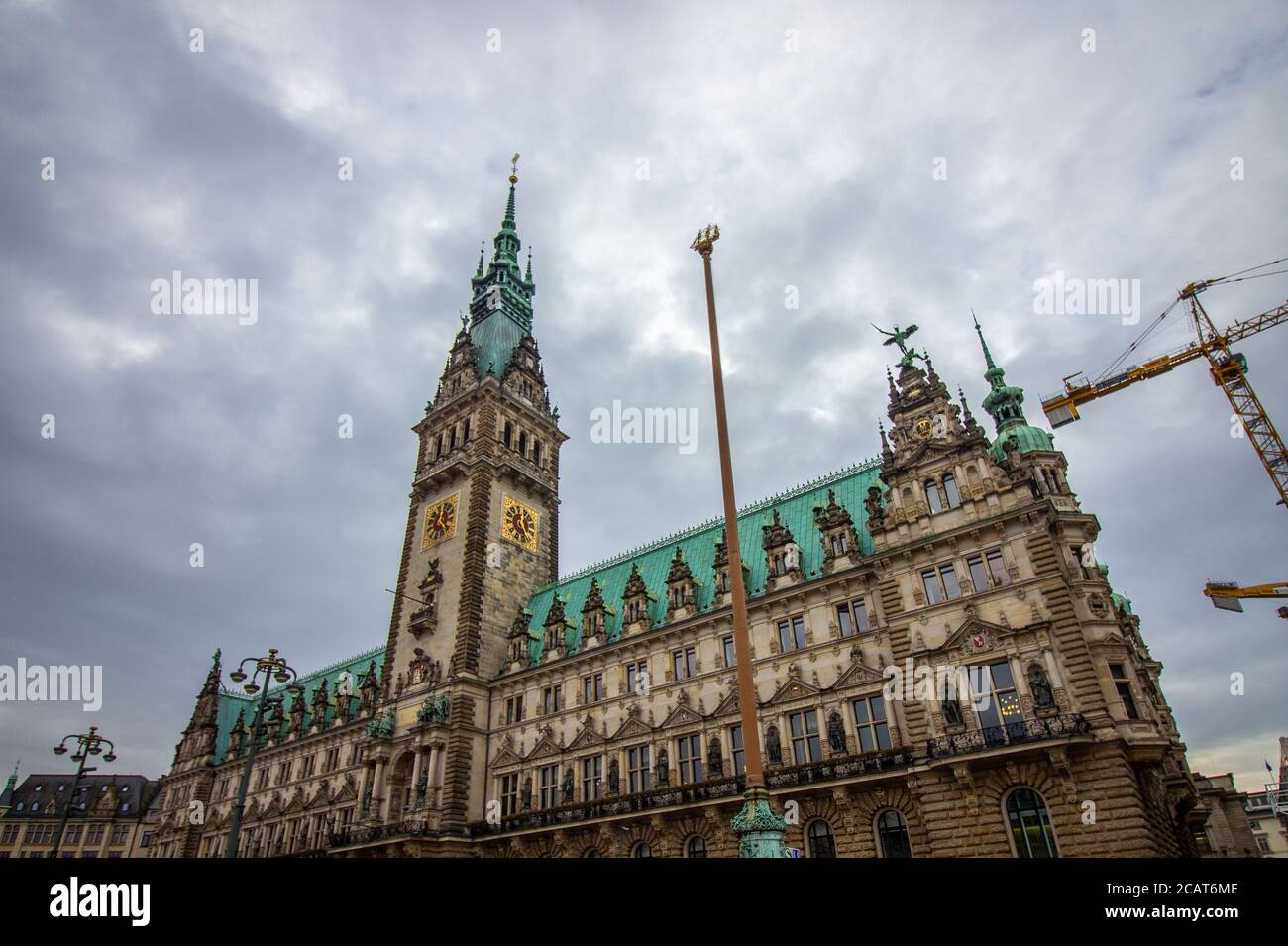 The famous Hamburg town hall with dramatic clouds at market square
