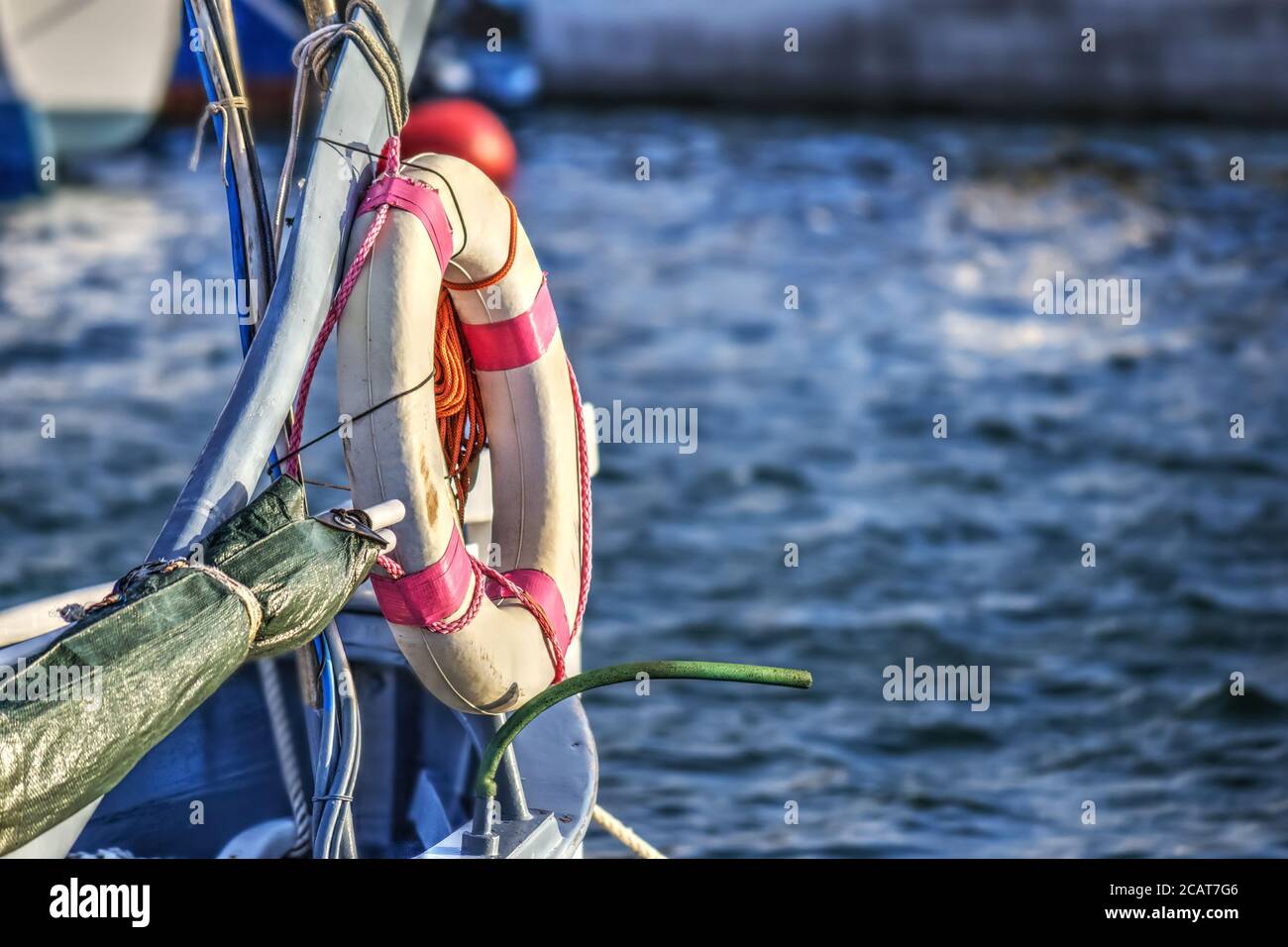 closeup of a life buoy on a wooden boat Stock Photo