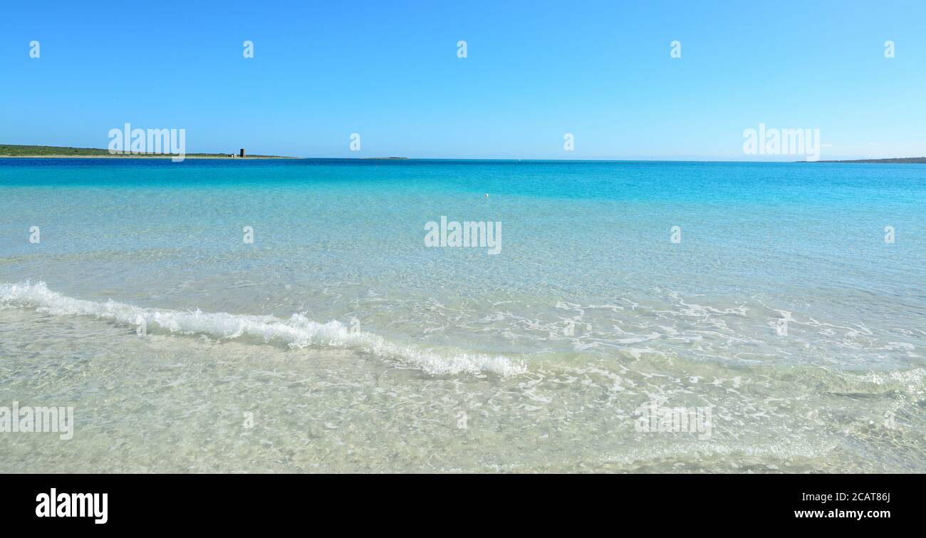 small wave in La Pelosa beach, Sardinia Stock Photo - Alamy