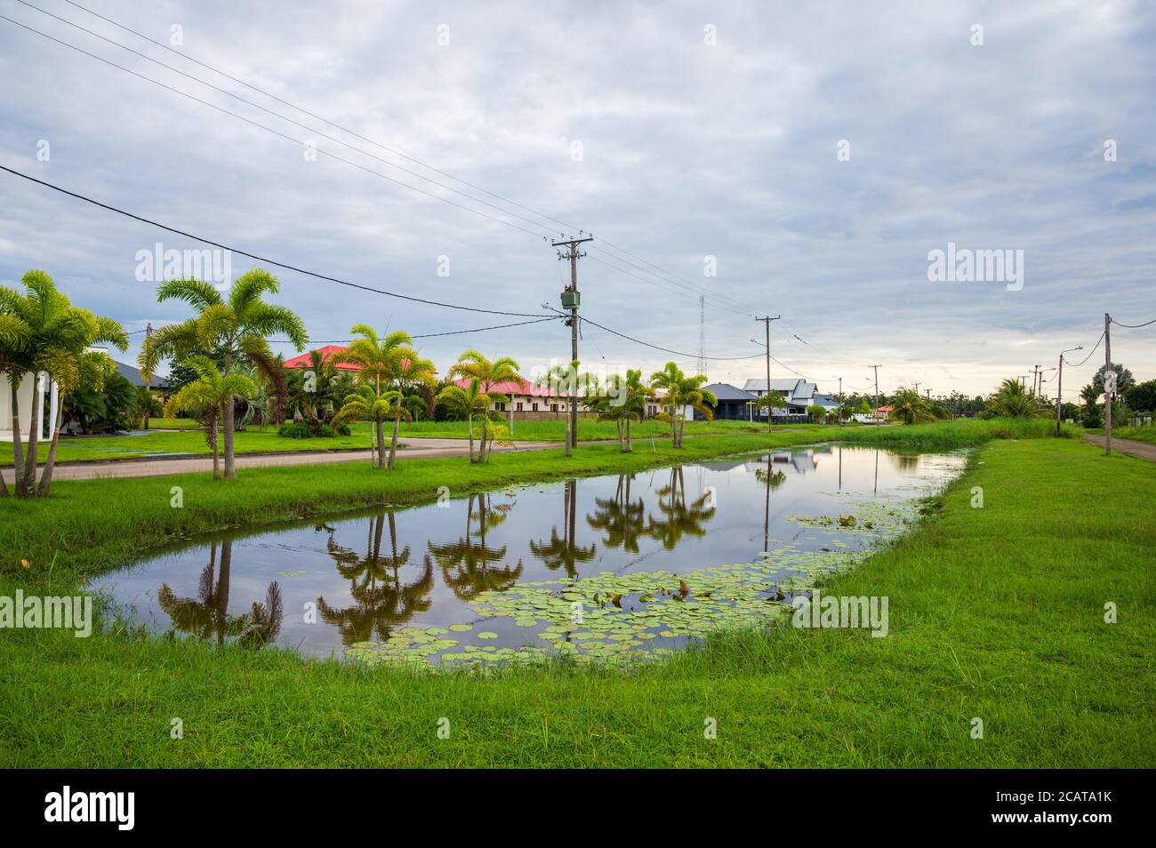 Canal in the northern suburb of capital city Paramaribo in Suriname, South America Stock Photo