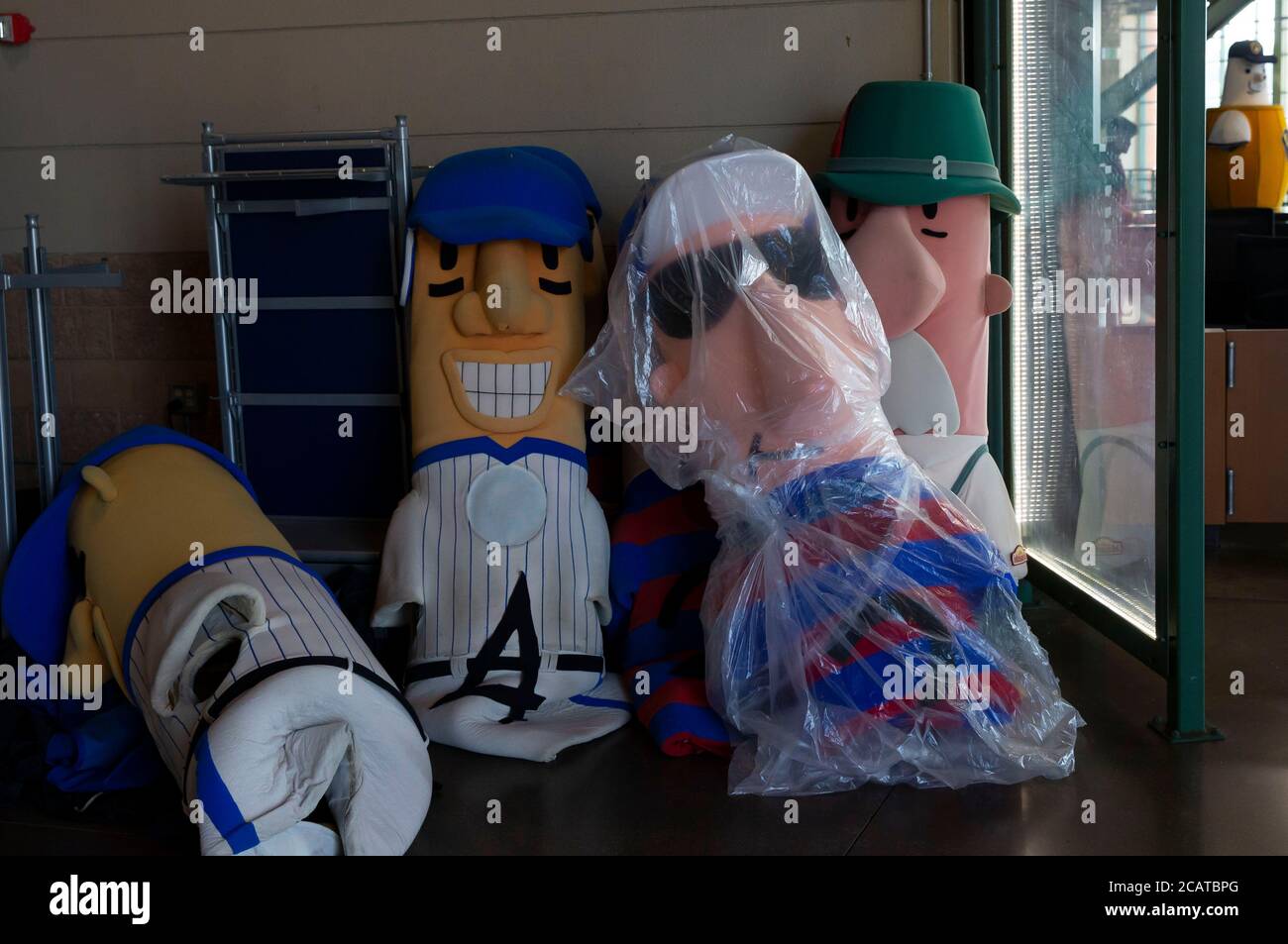 Milwaukee, USA. August 8, 2020: A favorite tradition the Brewer Sausage costumes lay up against a wall inside Miller Park before the Major League Baseball game between the Milwaukee Brewers and the Cincinnati Reds at Miller Park in Milwaukee, WI. The Sausage Racers are not being used this year. John Fisher/CSM Credit: Cal Sport Media/Alamy Live News Stock Photo