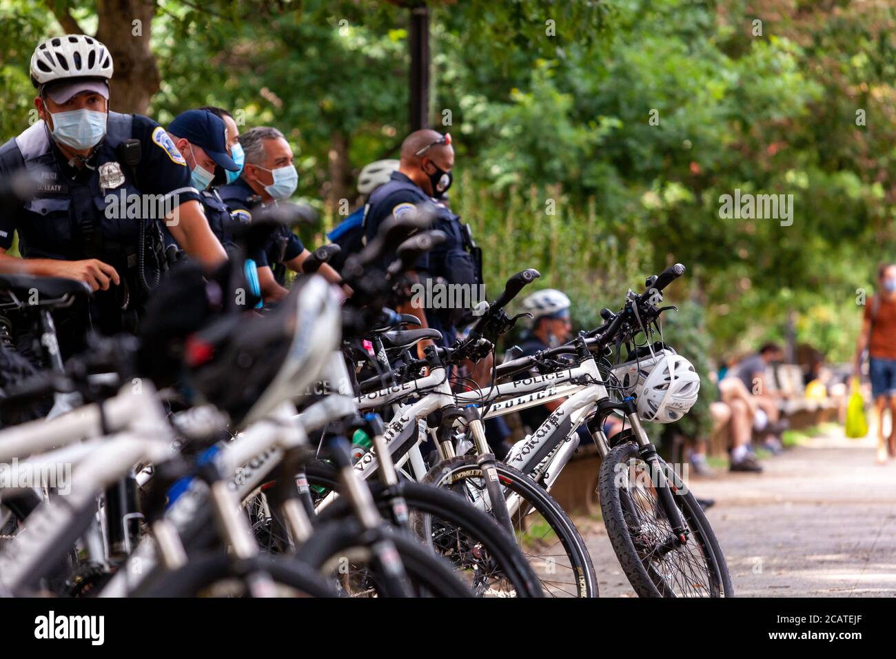 Washington, DC, USA. 8th Aug, 2020. Pictured: Metropolitan Police (DC Police) officersin a show of force to intimidate protesters in Meridian Hill Park (a.k.a. Malcolm X Park).  The bicycle officers were not part of the normal police escort for First Amendment demonstrations, and protest organizers were unaware that they would be present.  Credit: Allison C Bailey/Alamy Credit: Allison Bailey/Alamy Live News Stock Photo