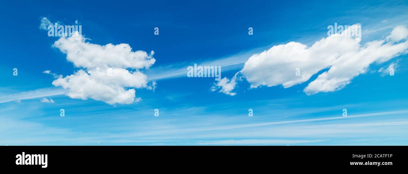 blue sky with white, soft clouds Stock Photo - Alamy