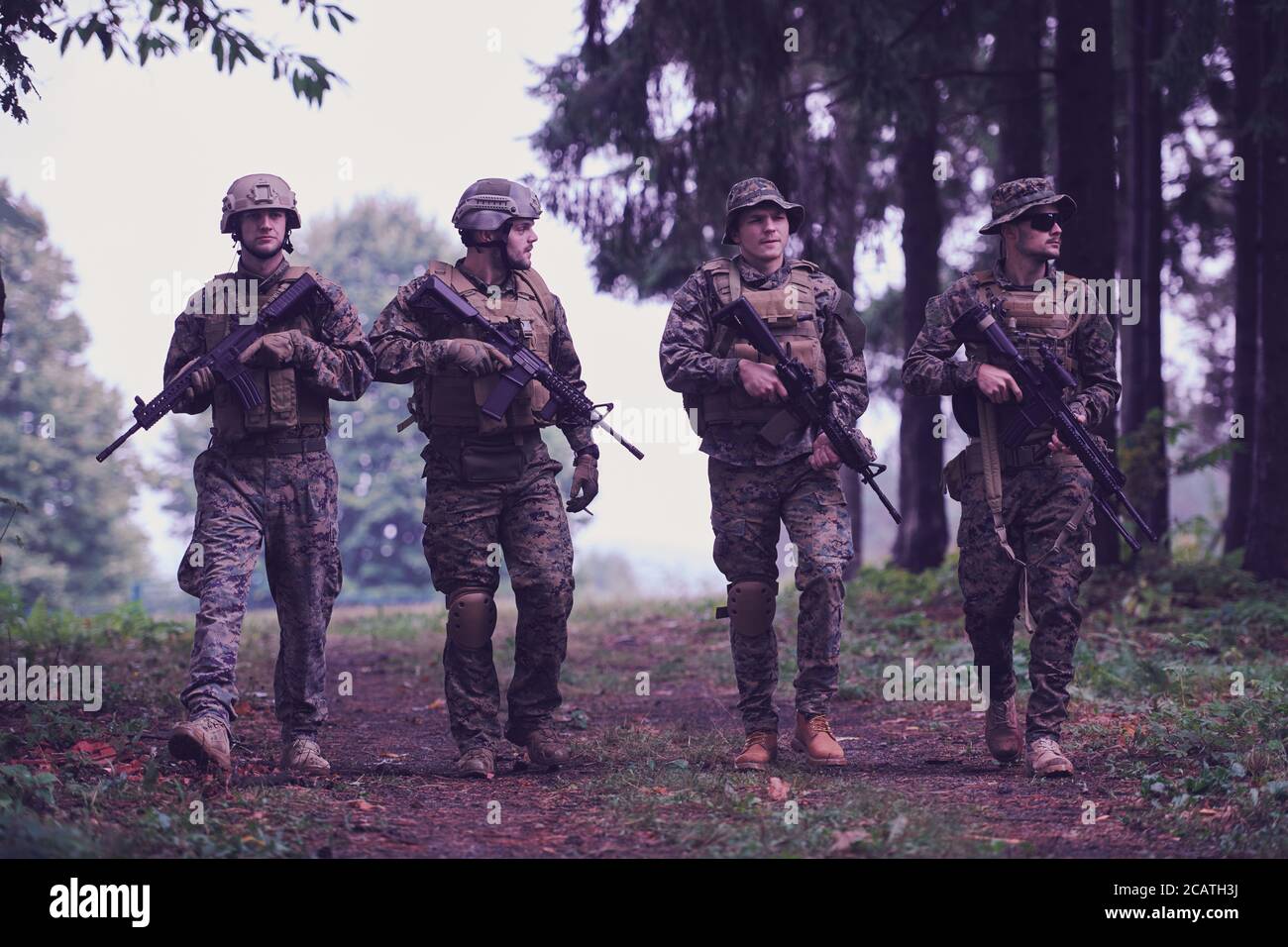 soldiers squad relaxed walking after battle Stock Photo - Alamy