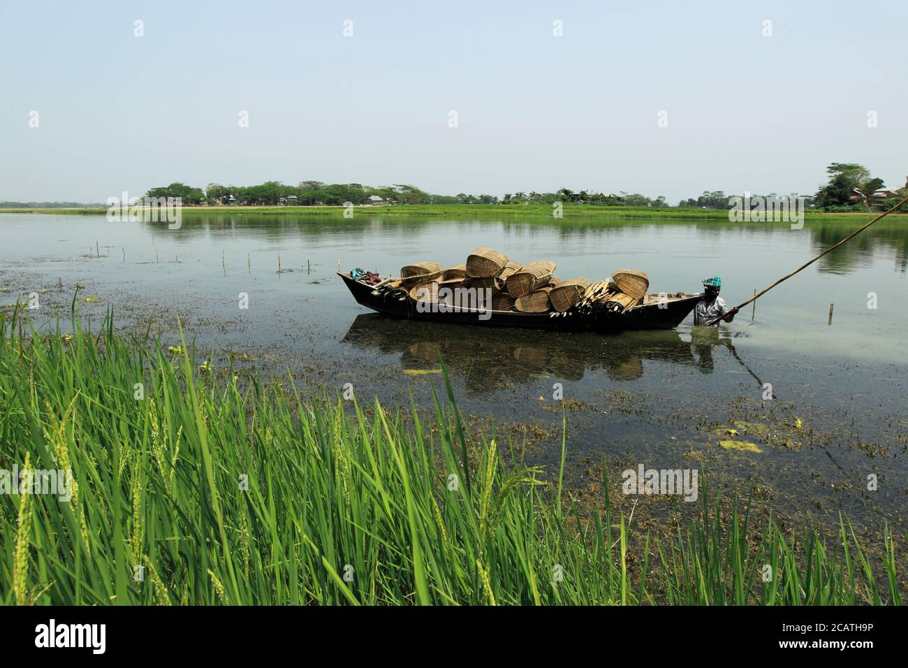 Traditional, Bangladesh boats on the bank of Jamuna the river. In the delta of rivers Ganga (Padma), the Brahmaputra, and Meghna people live on the water. Stock Photo