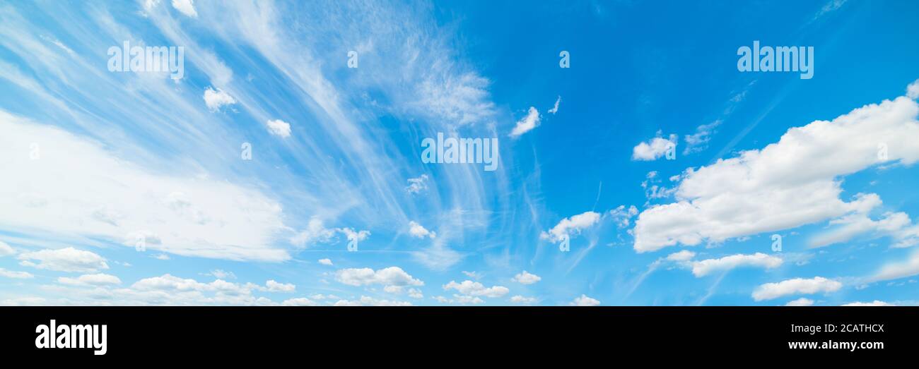 blue sky with white, soft clouds Stock Photo - Alamy