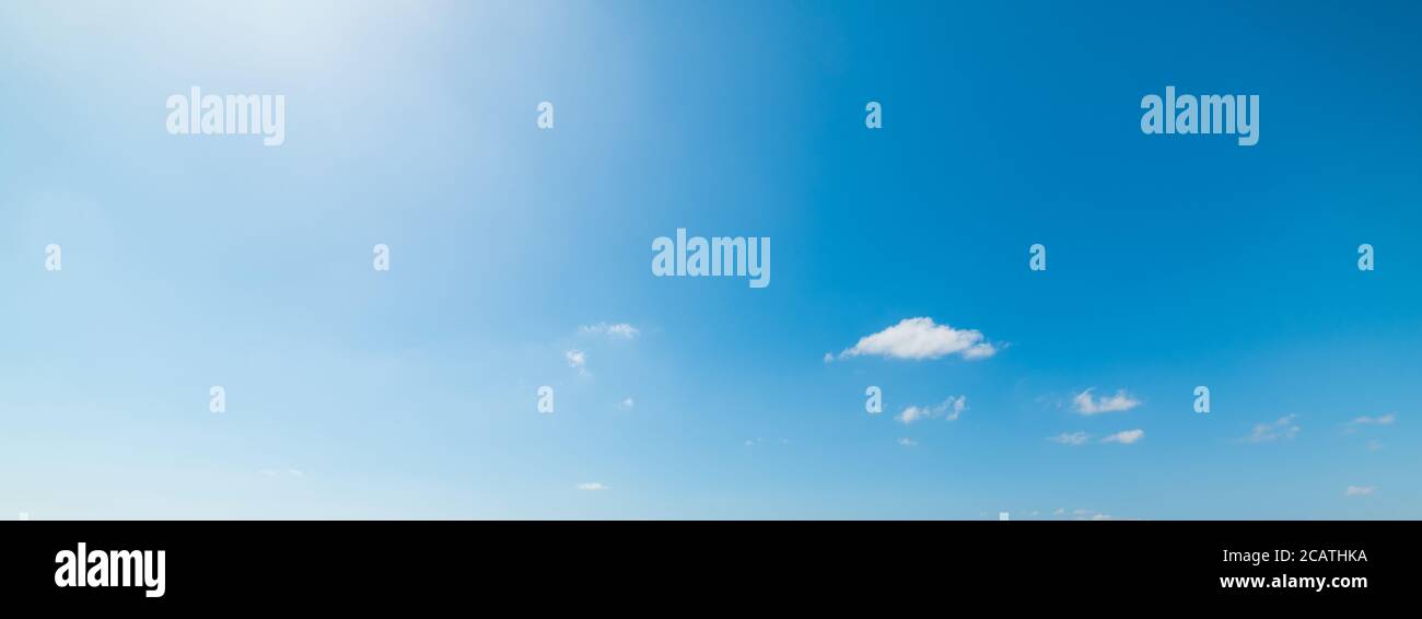 blue sky with white, soft clouds Stock Photo - Alamy