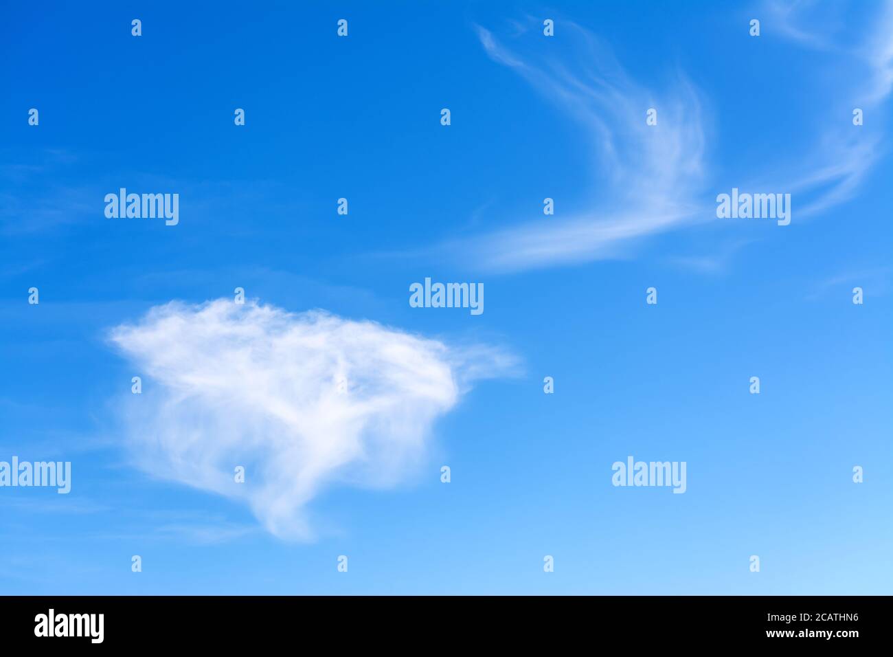 blue sky with white, soft clouds Stock Photo - Alamy