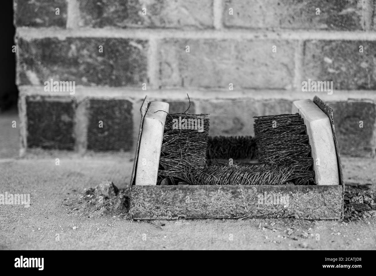 Tool used to remove dirt, dust, and mud from footwear Stock Photo - Alamy