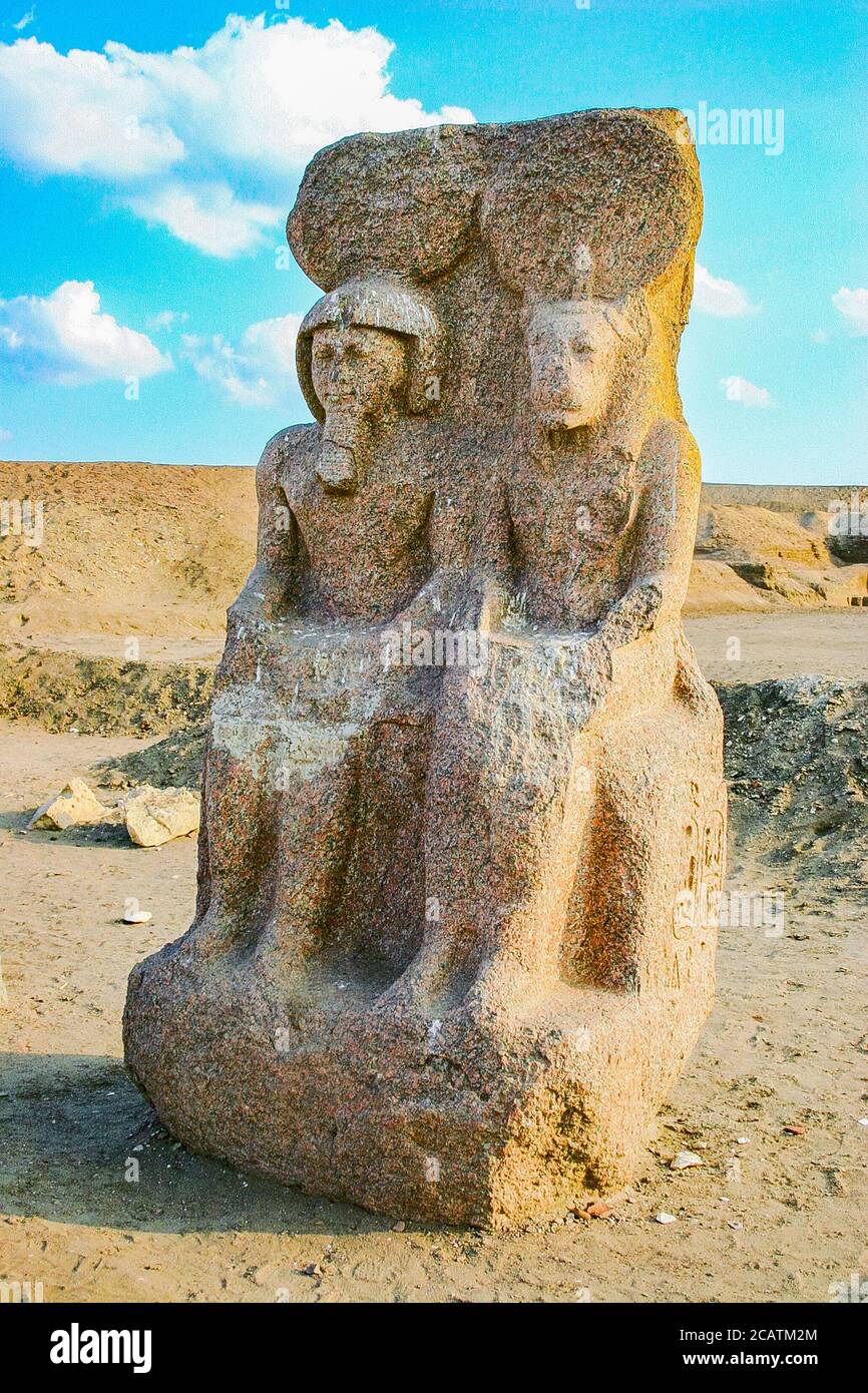 Egypt, Nile Delta, Tanis, the  temple of Mut and Khonsu, previously called temple of Anta : Dyad of the King Ramses as god Khonsu. Stock Photo