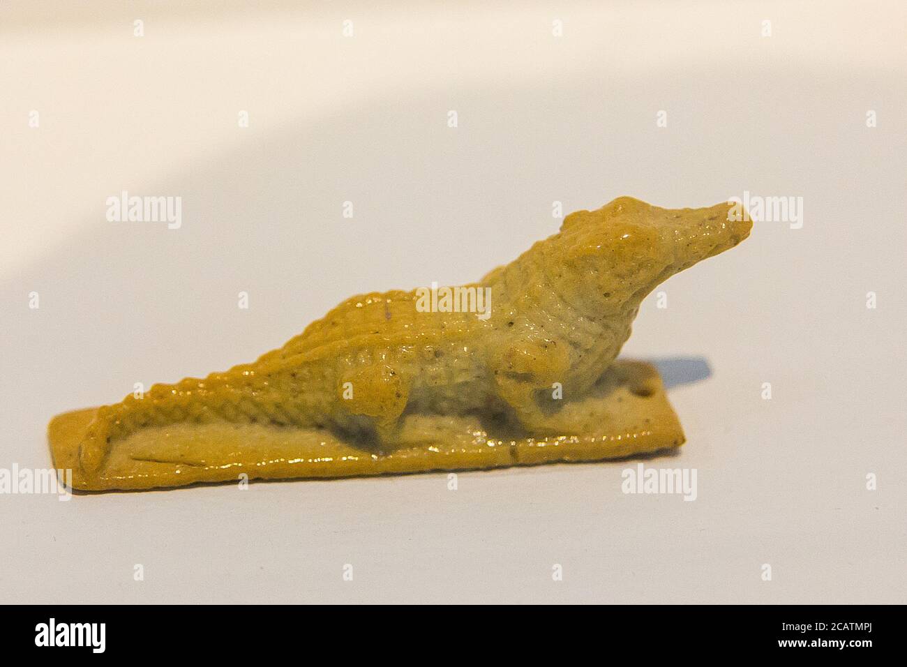 Exhibition 'The animal kingdom in Ancient Egypt', organized in 2015 by the Louvre Museum in Lens. Statuette of a crocodile, faience. Stock Photo