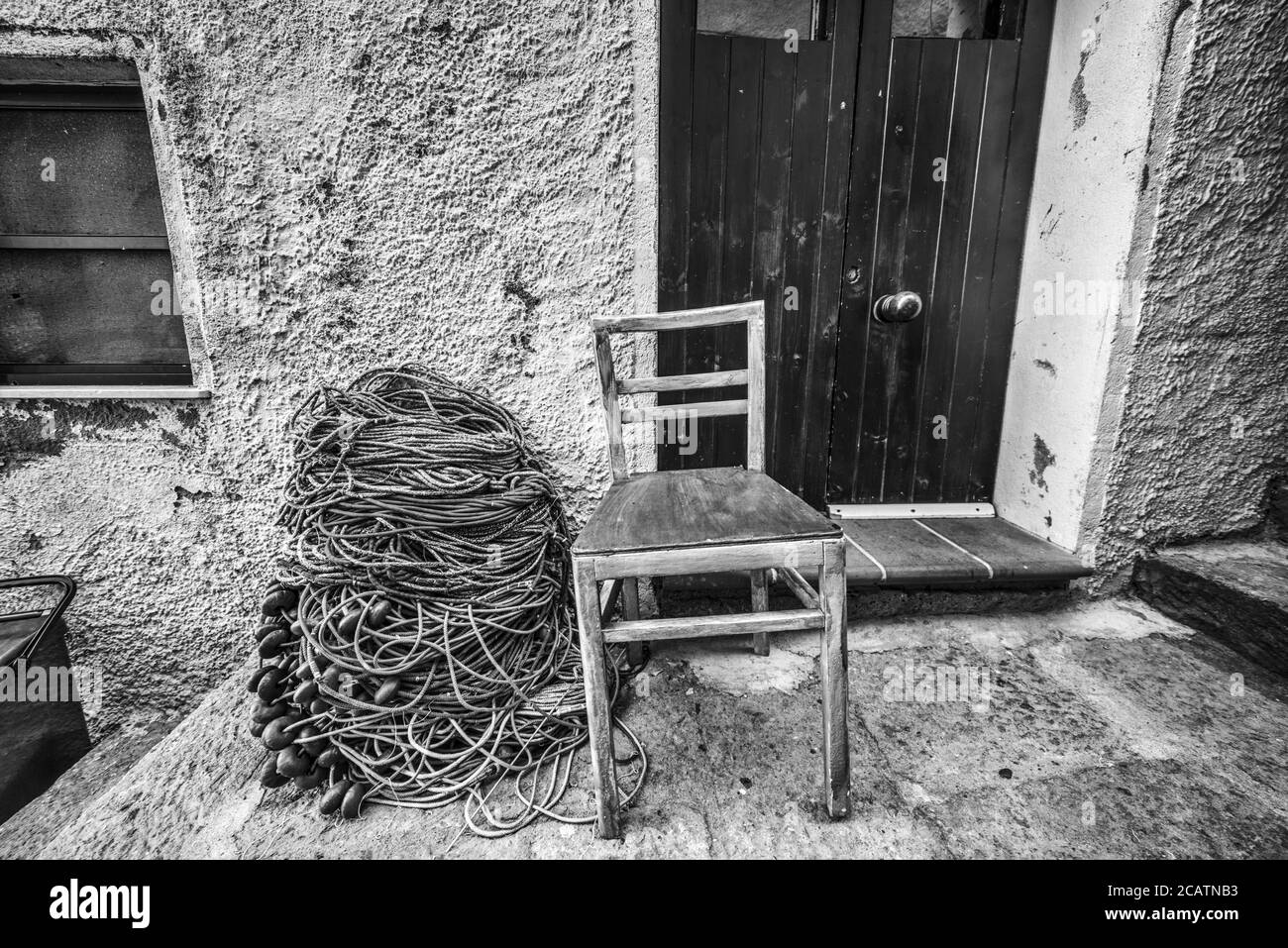 Black painted wooden chair Black and White Stock Photos & Images - Alamy