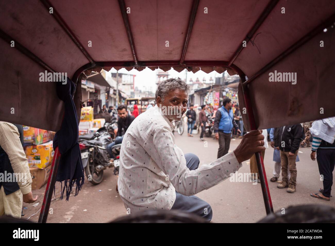 Agra / India - February 22, 2020: portrait of adult man rickshaw driver ...