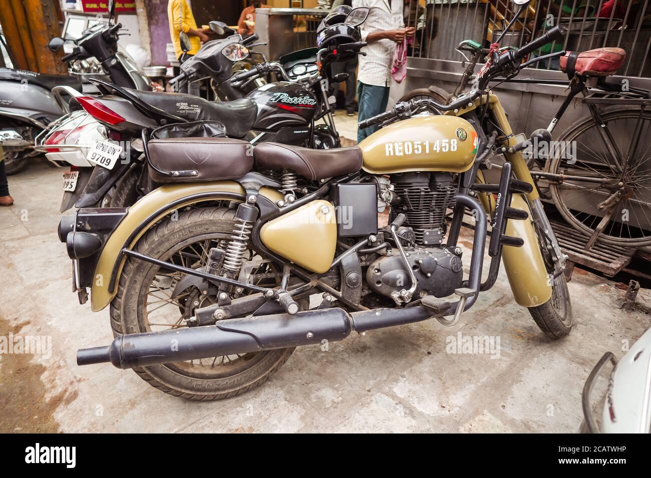 Agra / India - February 22, 2020: Traditional Royal Enfield motorcycle of military use parked in the center of Agra city Stock Photo