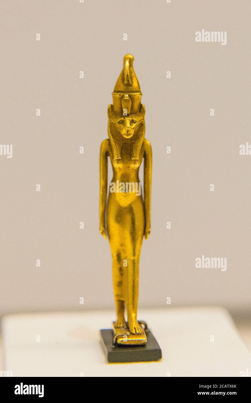 Exhibition 'The animal kingdom in Ancient Egypt', organized in 2015 by the Louvre Museum in Lens. Gold amulet, goddess with a lioness head. Stock Photo